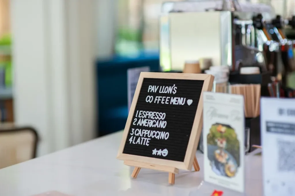 Cafe operator reviewing menu mix and pricing decisions